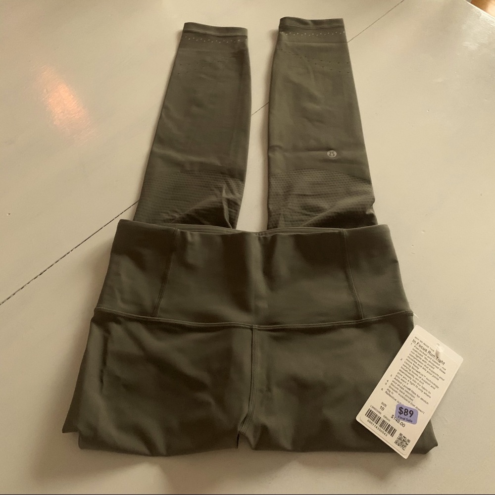 NWT In Focus Run Tight (Zoned In) Sz 10 Olive Grn